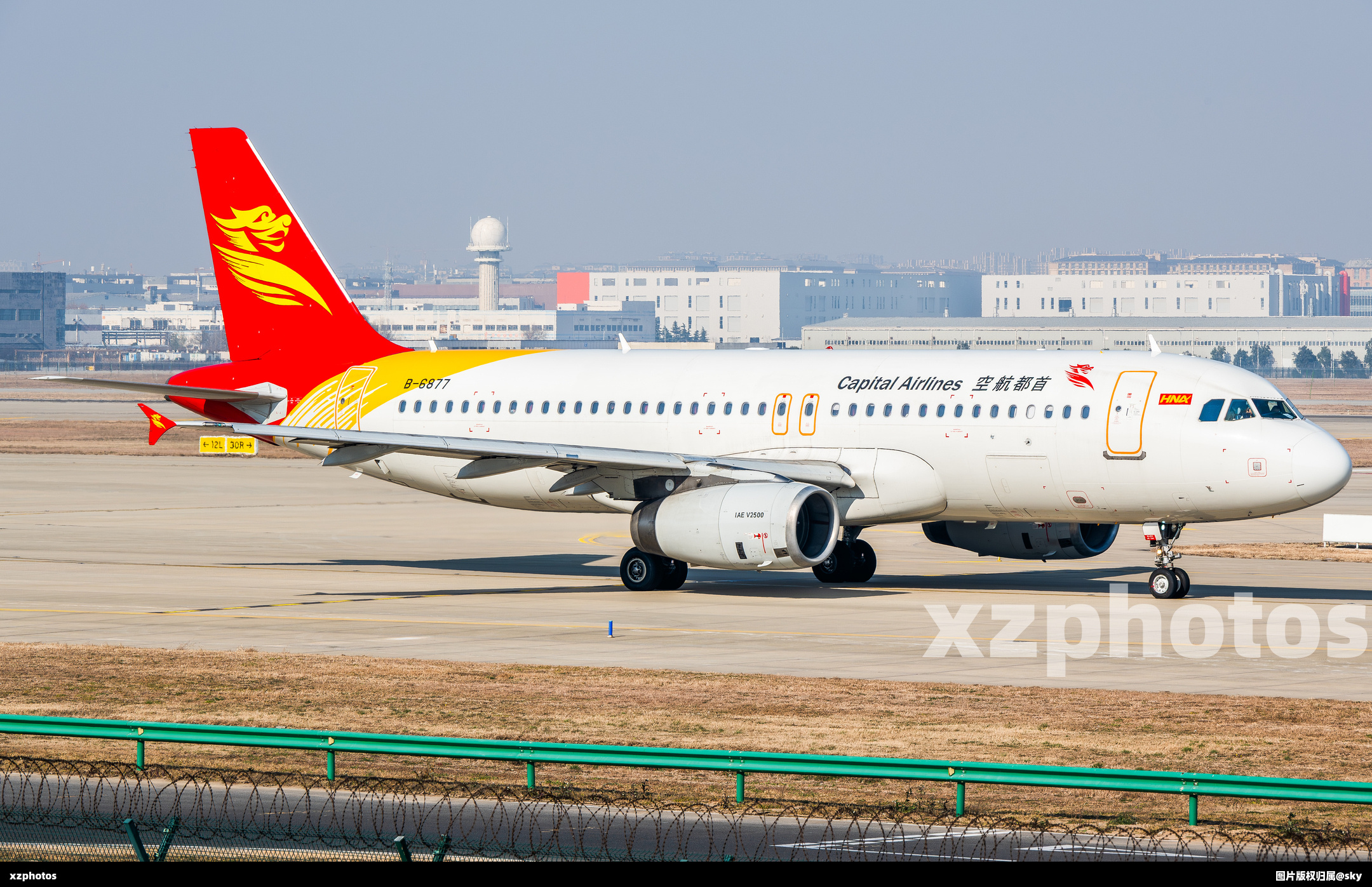 B-6877