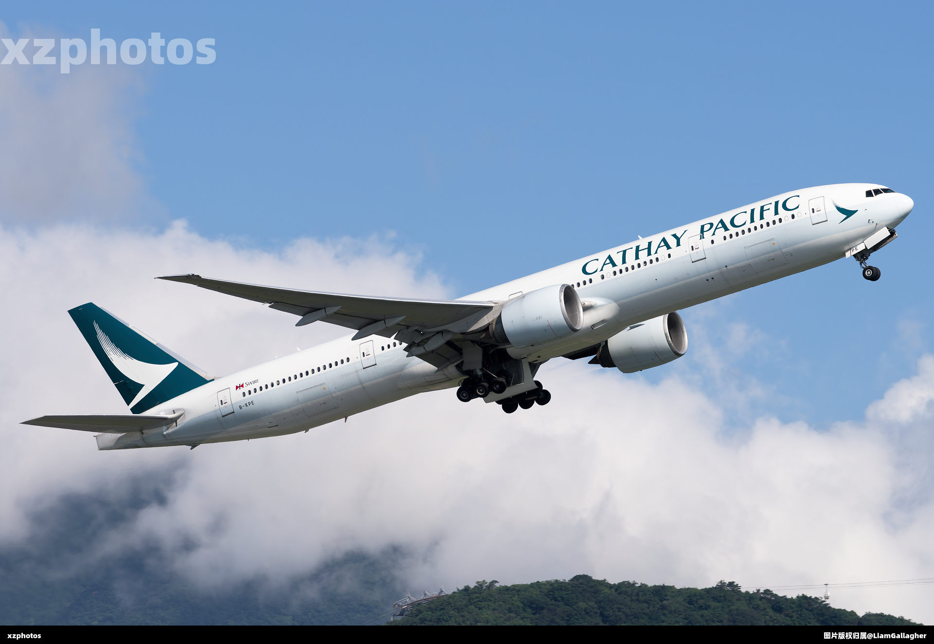 Cathay Pacific B77W rotating from HKG